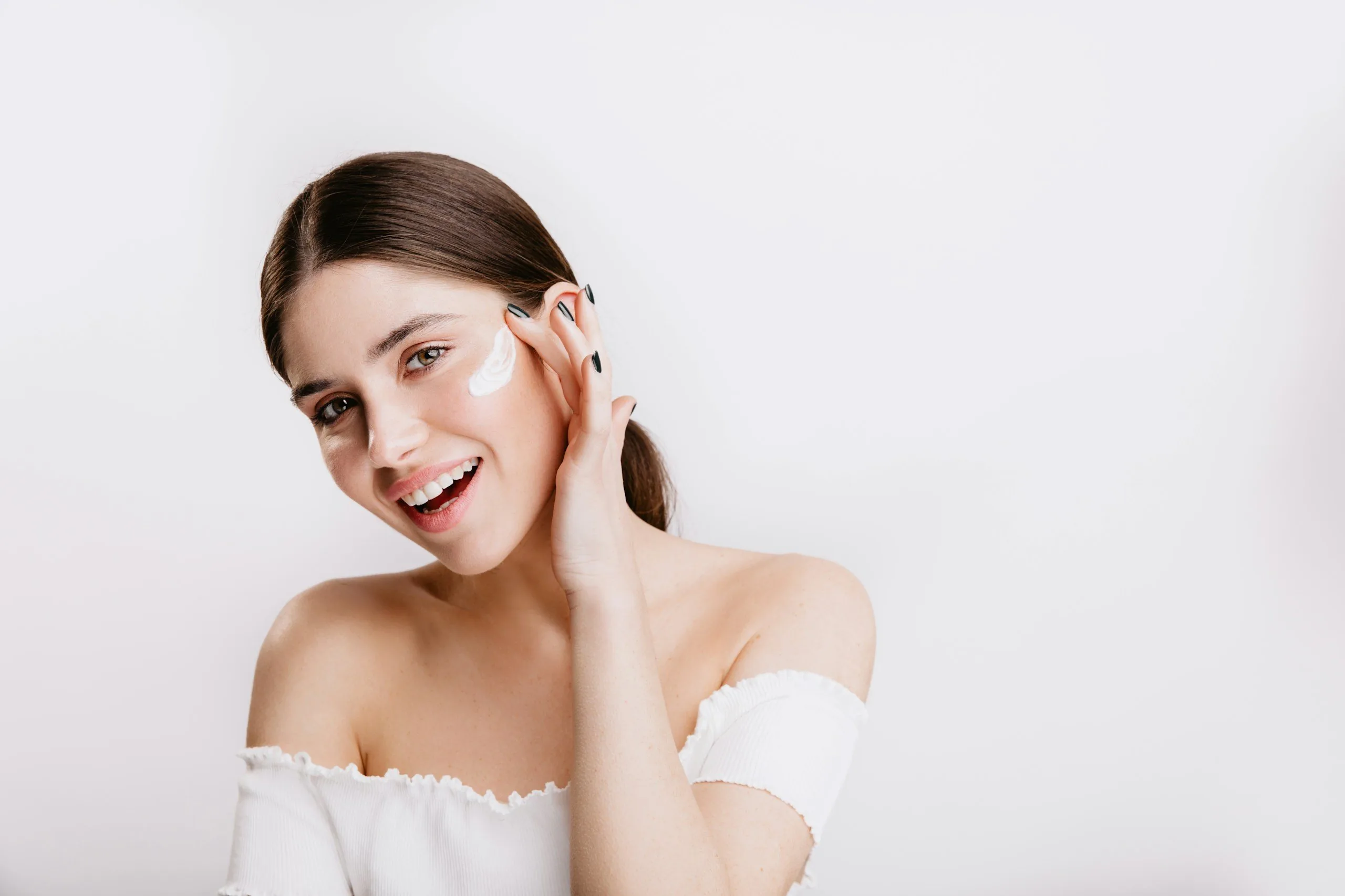 Smiling young woman with clear skin