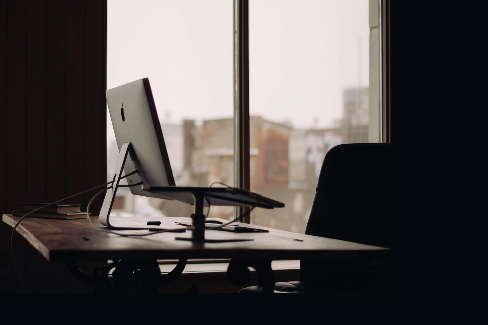 A quiet office desk by a window