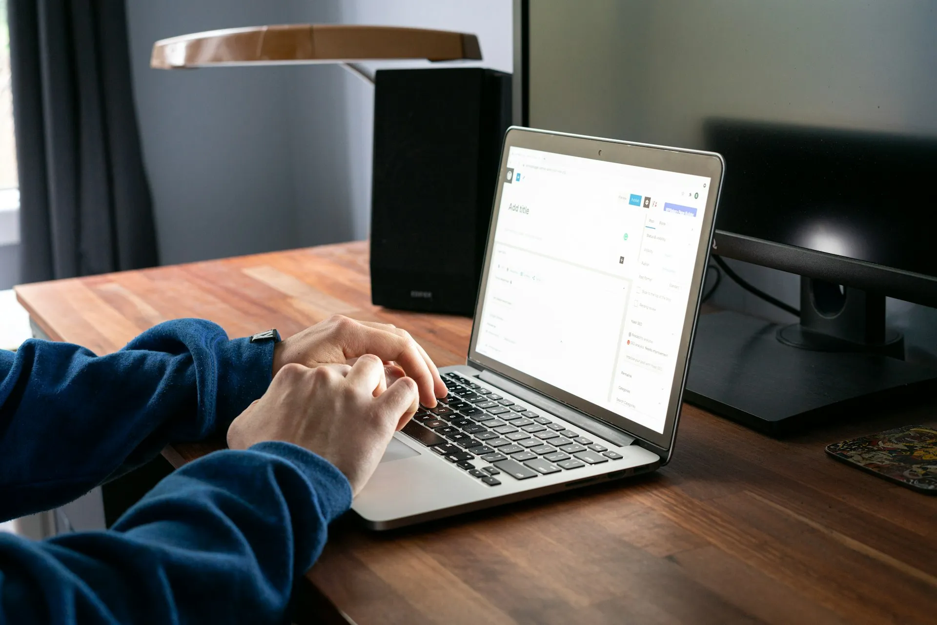Hands at a keyboard managing cloud workloads