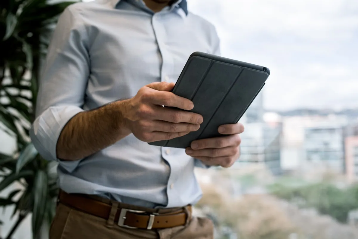 IT administrator managing mobile devices centrally
