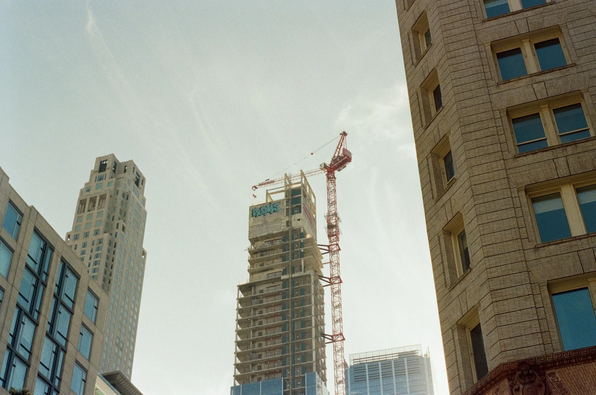 Tower crane beside a new Manhattan high-rise