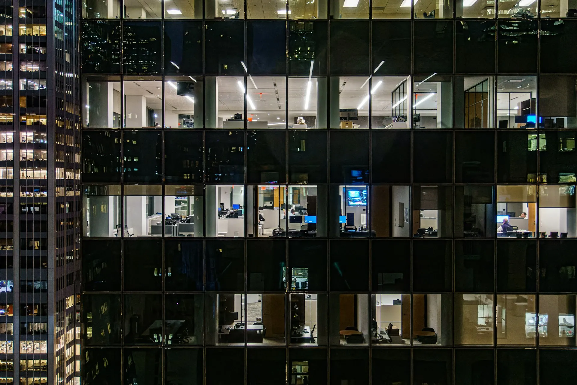 Manhattan office tower lit at night