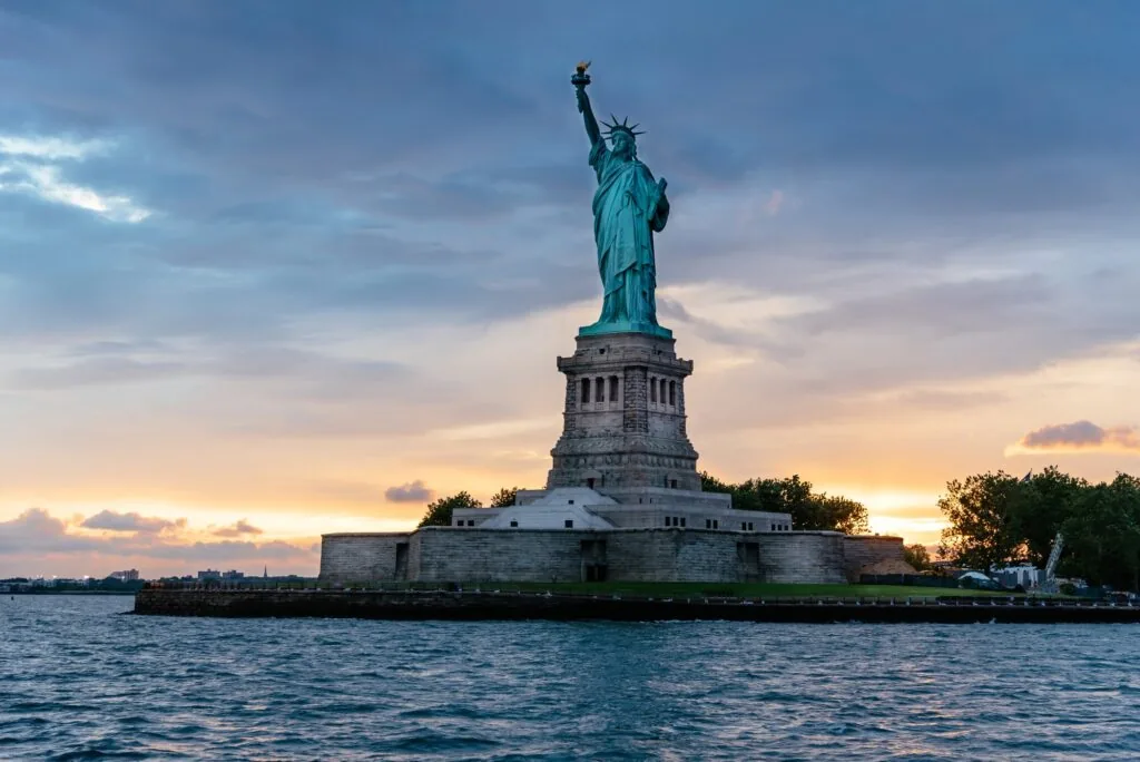 Statue of Liberty at sunset, near TMCA's Broadway office in New York
